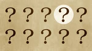 Two rows of black question marks on a beige background with one of the question marks spotlighted